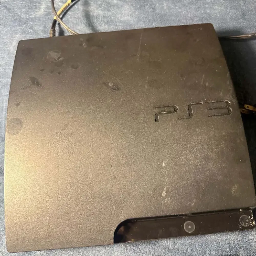 Sony PlayStation 3 Slim CECH-3001A Charcoal Black Console with Two Controllers